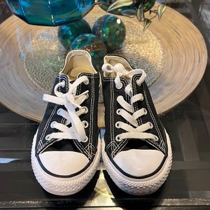 Boys size 12.5 black and white in color Converse